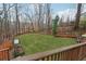 Large backyard with fire pit and garden space at 3455 Summit Trl, Cumming, GA 30041