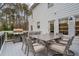 Outdoor deck featuring a grill and dining space for al fresco meals and gatherings at 1109 Wiley Bridge Rd, Woodstock, GA 30188