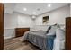 Cozy bedroom with ample natural light and a neutral color palette at 1109 Wiley Bridge Rd, Woodstock, GA 30188