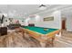 Spacious game room showcasing a pool table, seating, and great entertainment space at 1109 Wiley Bridge Rd, Woodstock, GA 30188