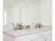 Bathroom with double vanity, quartz countertop, and modern chrome fixtures at 875 Venture Sw Way, Atlanta, GA 30331