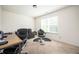 Bright bedroom with large window and workspace at 875 Venture Sw Way, Atlanta, GA 30331