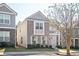 Two-story home with brick and siding, balcony, and landscaping at 875 Venture Sw Way, Atlanta, GA 30331