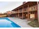 Inviting backyard with a refreshing pool, hot tub, and multi-story deck, perfect for outdoor relaxation and entertaining at 116 Big Cotton Trl, Mcdonough, GA 30252