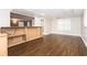 Unfinished bar area and wood-look flooring create a versatile space with potential for customization and personalization at 116 Big Cotton Trl, Mcdonough, GA 30252