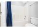 Clean bathroom featuring a white tub and shower with a blue patterned shower curtain at 116 Big Cotton Trl, Mcdonough, GA 30252