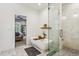 Modern bathroom featuring a freestanding tub and a glass-enclosed shower at 875 Berne Se St, Atlanta, GA 30316