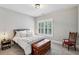 Bright bedroom with a comfortable bed and plenty of natural light at 875 Berne Se St, Atlanta, GA 30316