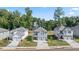 Community of two-story houses with gray and white siding at 1908 Holmsey Se Cir, Conyers, GA 30094