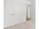 Spacious bedroom closet with double doors and neutral walls at 1908 Holmsey Se Cir, Conyers, GA 30094