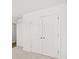 White double door closet in a bedroom at 1908 Holmsey Se Cir, Conyers, GA 30094