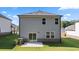 Gray house exterior with backyard patio at 1908 Holmsey Se Cir, Conyers, GA 30094