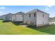 Gray siding house exterior, rear view at 1908 Holmsey Se Cir, Conyers, GA 30094