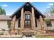 Front entrance with stone columns and double doors at 3355 Old Peachtree Rd, Dacula, GA 30019