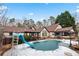 Inviting pool with slide, ready for summer fun at 3355 Old Peachtree Rd, Dacula, GA 30019