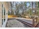 Spacious wood deck with multiple levels and views of the wooded backyard at 485 Kensington Parc Dr, Avondale Estates, GA 30002