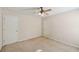 Bedroom has two white doors and a ceiling fan at 485 Kensington Parc Dr, Avondale Estates, GA 30002