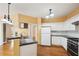 Bright kitchen offering sleek countertops, modern appliances and lots of natural light at 485 Kensington Parc Dr, Avondale Estates, GA 30002