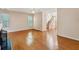 Bright living room featuring hardwood floors, neutral walls and staircase access at 485 Kensington Parc Dr, Avondale Estates, GA 30002