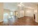Spacious living room featuring a fireplace, hardwood floors, and modern light fixtures at 4671 W Lake Se Dr, Conyers, GA 30094