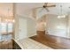 Open concept living room and kitchen features hardwood floors, tile and vaulted ceilings at 4671 W Lake Se Dr, Conyers, GA 30094