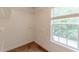 Bright walk-in closet with wire shelving on all sides and a window providing natural light at 4671 W Lake Se Dr, Conyers, GA 30094