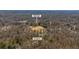 Aerial view of the property location, 96 Grand Ave, near the community pool and tennis courts in a wooded area at 96 Grand Ave, Suwanee, GA 30024