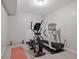 Basement gym featuring cardio machines with neutral walls and carpeted floors at 96 Grand Ave, Suwanee, GA 30024