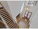 Elegant foyer with hardwood floors, staircase, a chandelier, and a decorative glass front door at 96 Grand Ave, Suwanee, GA 30024