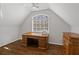 Bright office with hardwood floors, vaulted ceiling, and built-in wooden desk at 96 Grand Ave, Suwanee, GA 30024