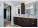 Stylish bathroom features a double vanity with dark wood cabinets and modern fixtures at 3979 Doral Cir, Atlanta, GA 30360