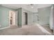 Bright bedroom with carpet, ceiling fan, and plenty of closet space at 3979 Doral Cir, Atlanta, GA 30360