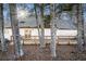 Back of house with deck surrounded by trees at 3979 Doral Cir, Atlanta, GA 30360