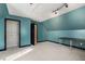 Office with teal walls, closet, and a desk at 3979 Doral Cir, Atlanta, GA 30360