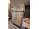 Bathroom with glass shower and modern fixtures at 4045 Mark Todd Ct, Hoschton, GA 30548