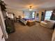 Bright main bedroom with carpeted floors and ample closet space at 4045 Mark Todd Ct, Hoschton, GA 30548