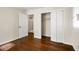 Bedroom with hardwood floors, closet, and access to a bath at 1801 Se Caribaea Se Trl, Atlanta, GA 30316