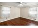 Bedroom with hardwood floors and two windows at 1801 Se Caribaea Se Trl, Atlanta, GA 30316