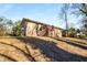 Brick house exterior with a deck and steps at 1801 Se Caribaea Se Trl, Atlanta, GA 30316