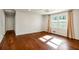 Bright bedroom with hardwood floors and large windows at 1801 Se Caribaea Se Trl, Atlanta, GA 30316