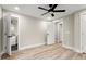 Bedroom with ceiling fan and access to bathroom at 384 Saint Johns Sw Ave, Atlanta, GA 30315