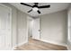 Bedroom with ceiling fan and access to hallway at 384 Saint Johns Sw Ave, Atlanta, GA 30315