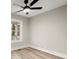 Bright bedroom with ceiling fan and hardwood floors at 384 Saint Johns Sw Ave, Atlanta, GA 30315