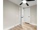 Spacious bedroom with ceiling fan and two closets at 384 Saint Johns Sw Ave, Atlanta, GA 30315