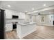 Modern kitchen with white cabinets, granite countertops, and stainless steel appliances at 384 Saint Johns Sw Ave, Atlanta, GA 30315