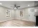 Bright and airy living room featuring hardwood floors and large windows at 384 Saint Johns Sw Ave, Atlanta, GA 30315