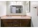 Double vanity bathroom with granite countertop and neutral tones at 620 Oakstone Way, Roswell, GA 30075