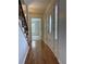 Bright entryway with hardwood floors, featuring a view to the living room at 620 Oakstone Way, Roswell, GA 30075