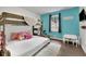 ' bedroom with bunk bed, desk, and a colorful wall at 97 Grayson New Hope Rd, Grayson, GA 30017