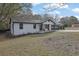 Newly remodeled home with white siding and a spacious yard at 97 Grayson New Hope Rd, Grayson, GA 30017